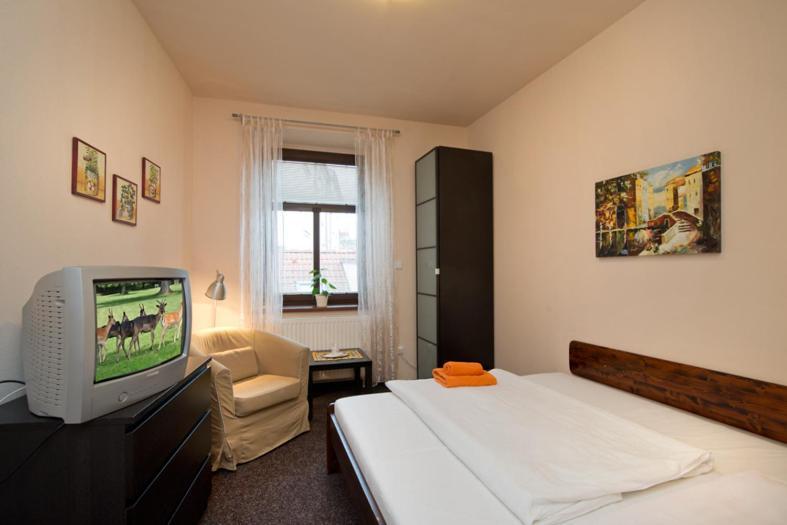 Hotel U Zlateho Byka Písek Oda fotoğraf
